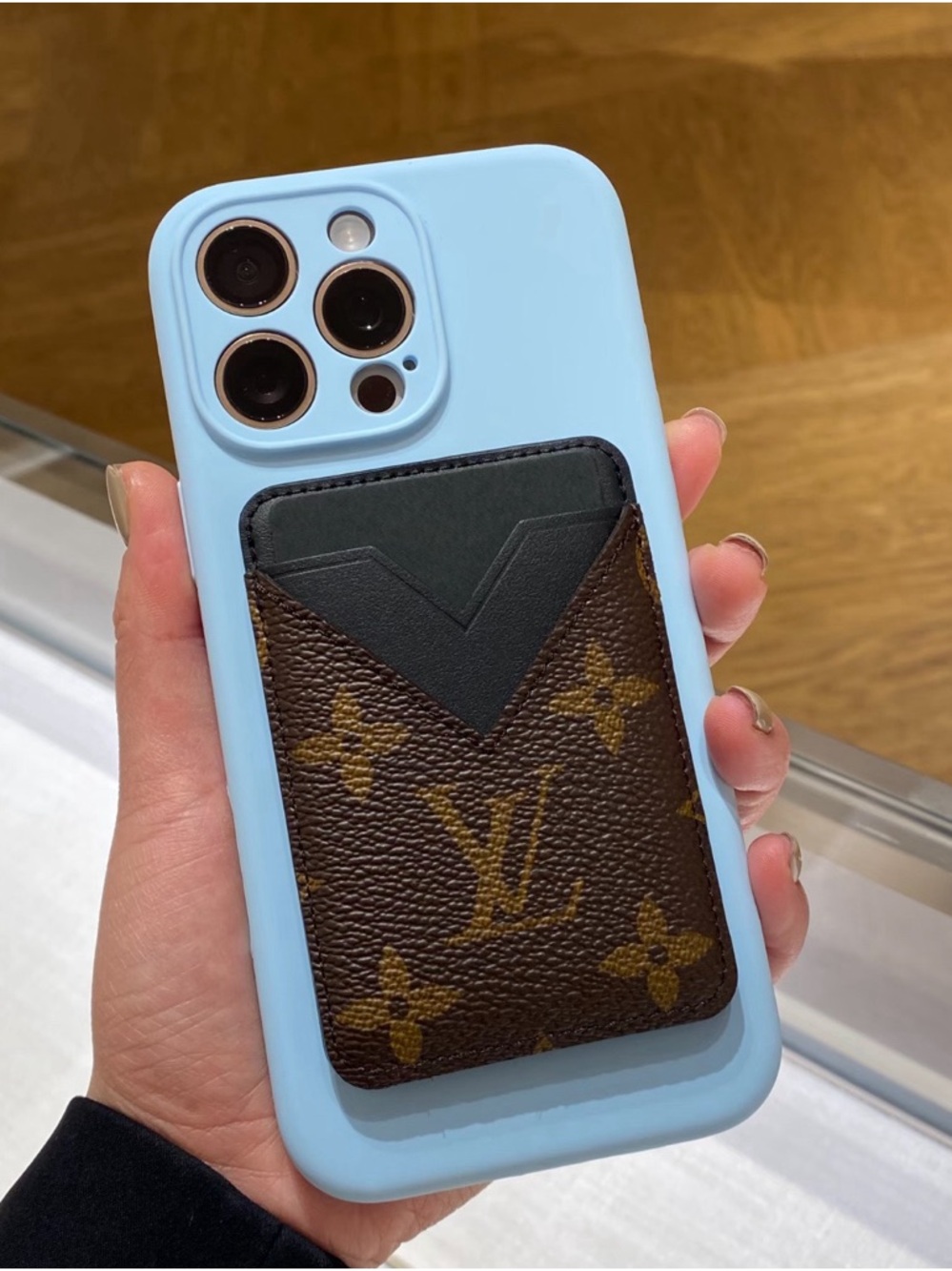 Louis Vuitton MonogramMagnetic Magsafe Holder Attached to Light Blue Phone Case